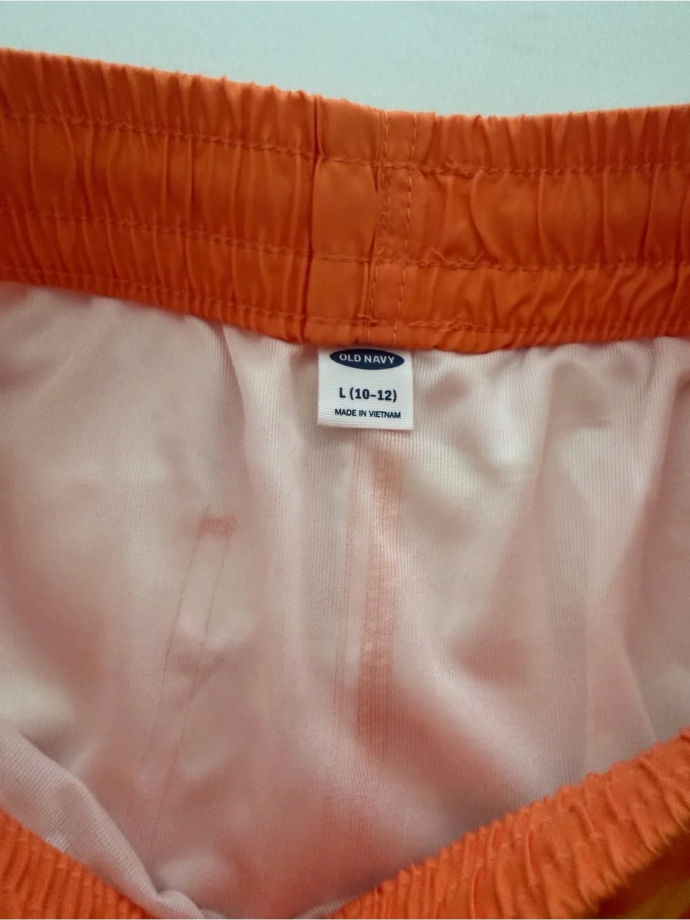 (NWT) Old Navy Boy’s Dinosaur 🦖 Swim Trunks in Orange/Multi, Large (10/12)